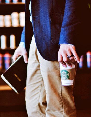 businessman in coffee shop coffee cup on cyan background
