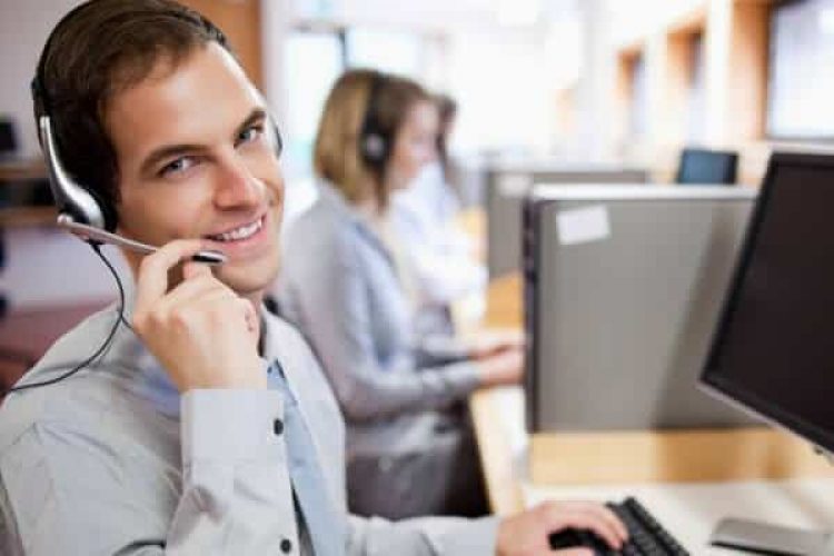 Man in call center using local caller id